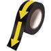 black tape with yellow arrows